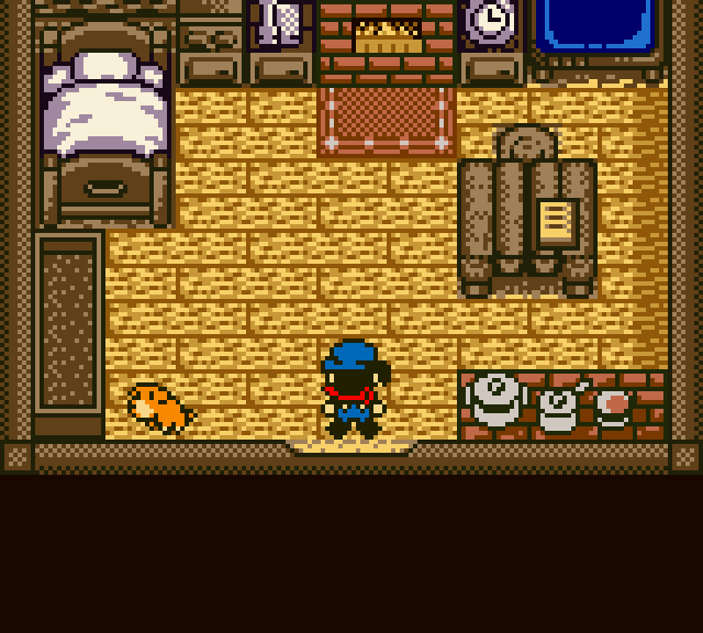 Player house interior in Harvest Moon GBC with the TV in the top-right corner.