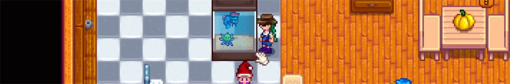 A sea urchin wearing a hat in a fish tank