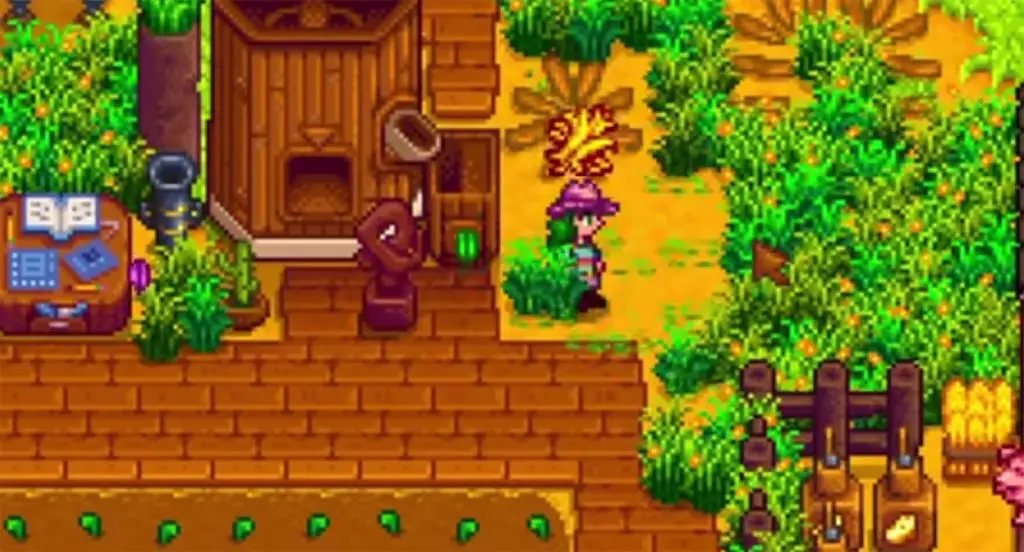 A pile of hay and a patch of grass in Stardew Valley