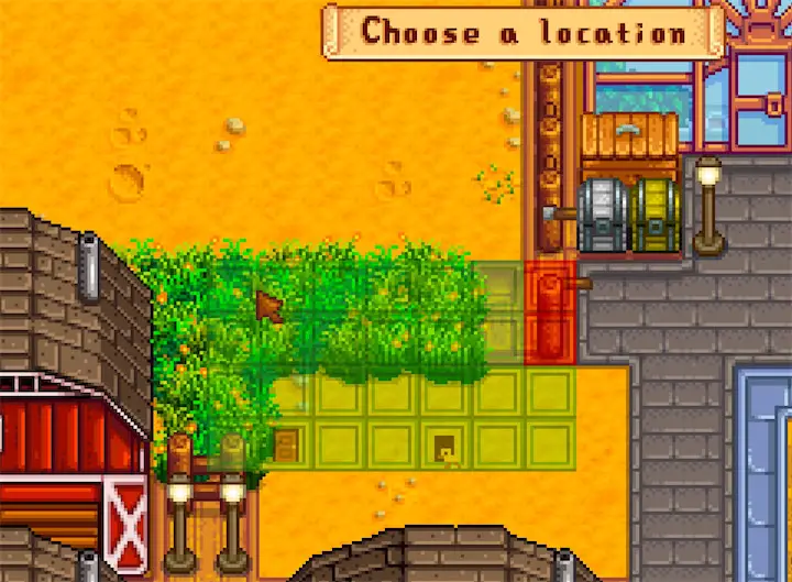 A player moving a farm building in Stardew Valley