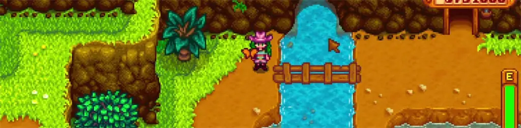 A screenshot of a player standing by a river in Stardew Valley
