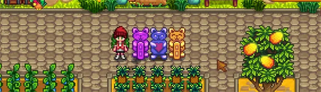 Three Lucky Cat statues from Stardew Valley together